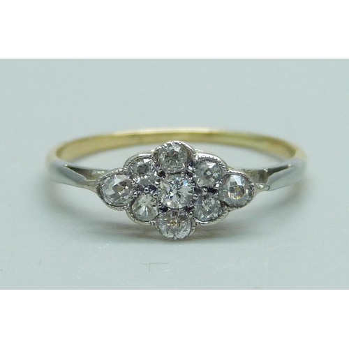 1019 - An 18ct gold, platinum and diamond cluster ring, 1.3g, M