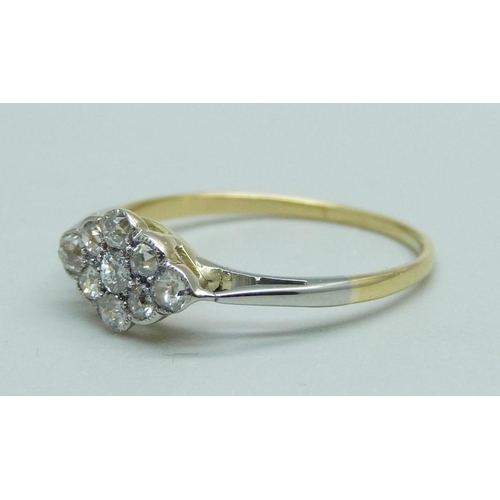 1019 - An 18ct gold, platinum and diamond cluster ring, 1.3g, M