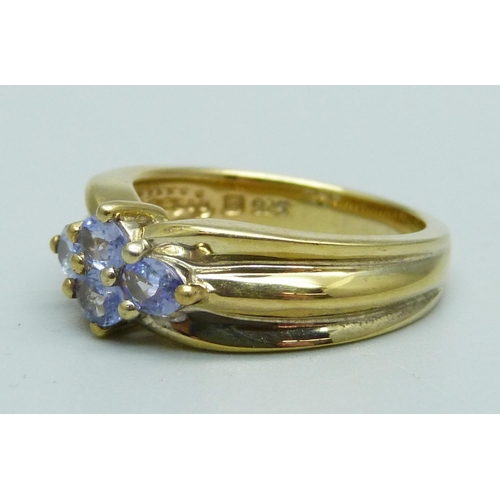 1027 - A silver gilt and tanzanite cluster ring, N