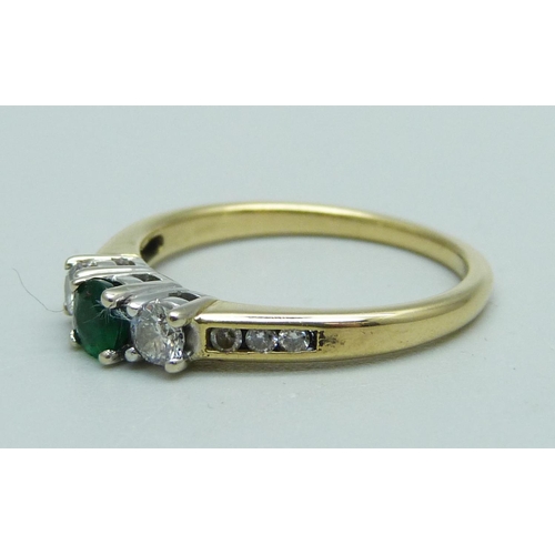 1039 - An 18ct gold, emerald and diamond ring, 3.2g, N