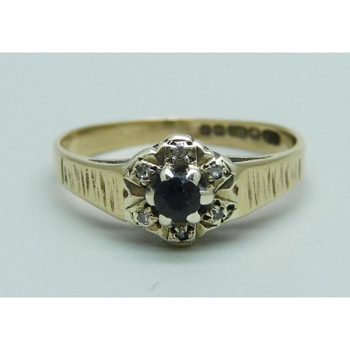 1040 - A 9ct gold, sapphire and diamond cluster ring, 2g, L