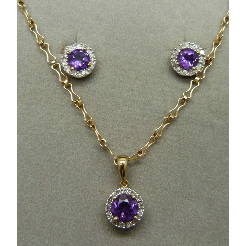 1055 - A 9ct gold, amethyst and diamond pendant on chain with matching earrings