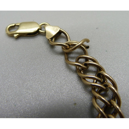 1057 - A 9ct gold bracelet, 7.2g, (hollow links and one link a/f)