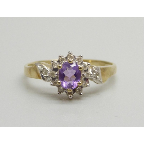 1065 - A 9ct gold, amethyst and diamond cluster ring, 1.7g, N