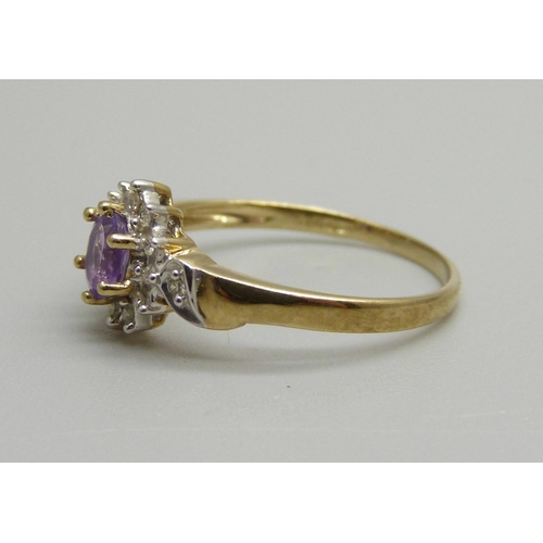 1065 - A 9ct gold, amethyst and diamond cluster ring, 1.7g, N