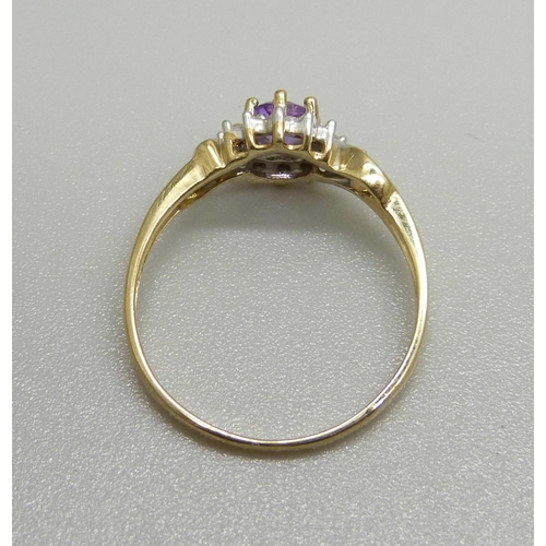 1065 - A 9ct gold, amethyst and diamond cluster ring, 1.7g, N