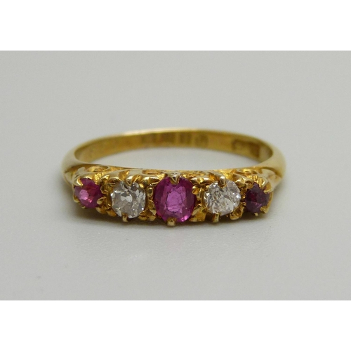 1066 - An 18ct gold, ruby and diamond ring, 2.5g, K, (one stone possibly replaced)