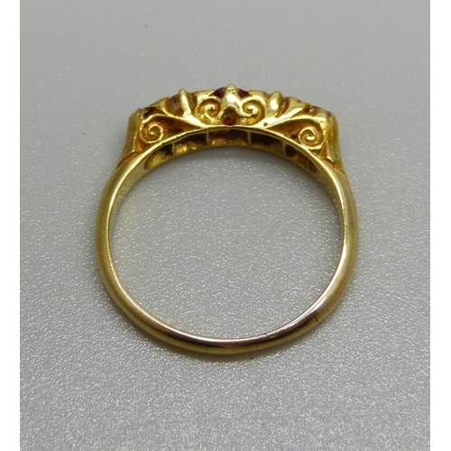 1066 - An 18ct gold, ruby and diamond ring, 2.5g, K, (one stone possibly replaced)