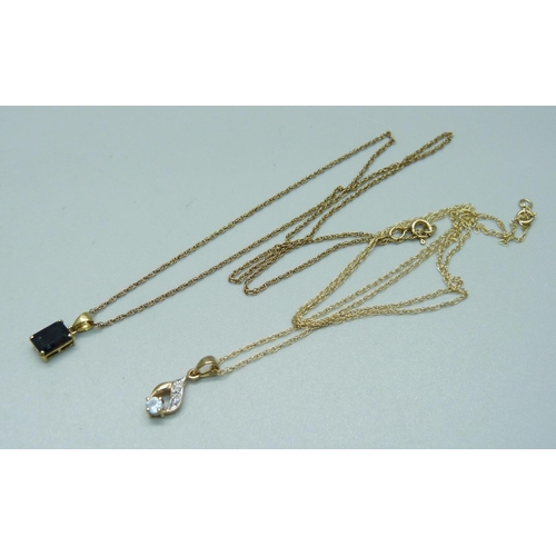 1079 - Two 9ct gold pendants, one 9ct gold chain and one gold plated chain