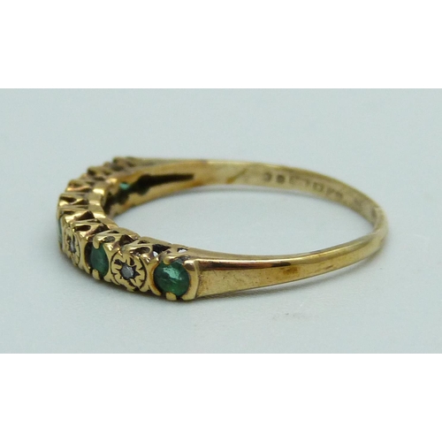 1088 - A 9ct gold, green stone and diamond ring, 1.3g, L