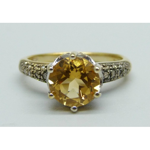 1099 - A silver gilt, citrine and forty champagne diamond ring, N, with certificate