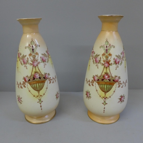 610 - A pair of Crown Devon Etna blush ivory vases, 24cm