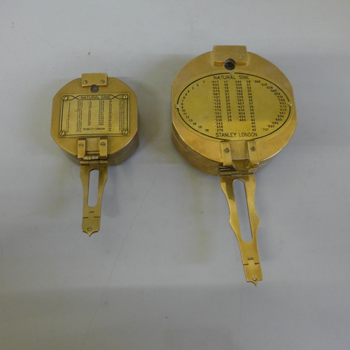 623 - Two Stanley London brass compasses