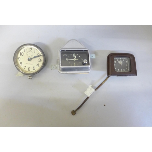 627 - A Waltham car clock, one other made in U.S.A. and a Ford clock with Bakelite surround