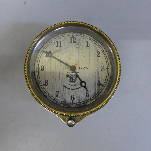 628 - A brass cased Smiths car clock