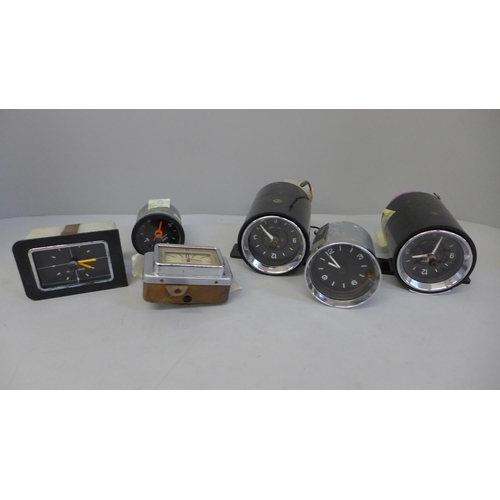 639 - A pair of Kienzle car clocks and four others