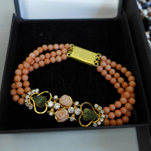 649 - Coral and pearl jewellery; four necklaces and a bracelet