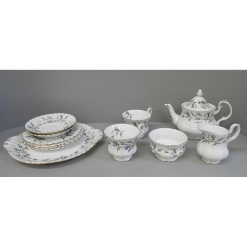 662 - A set of Royal Albert Brigadoon pattern china comprising two tea cups, a tea pot, a milk jug and sug... 