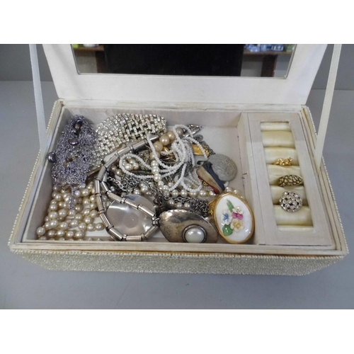 664 - A jewellery box and costume jewellery