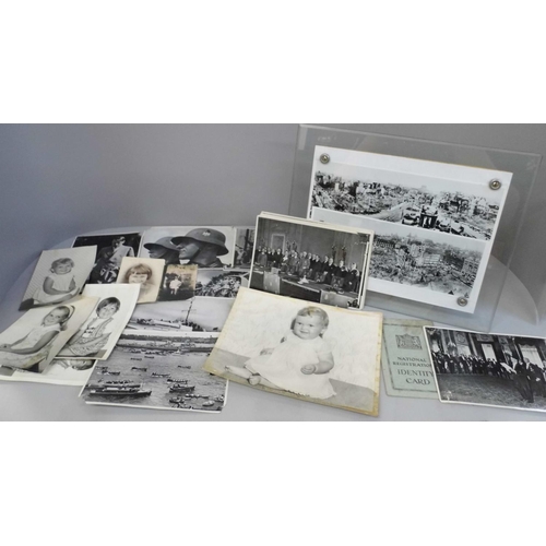 668 - Two black and white photographs of the Liverpool blitz, Adolf Hitler album cards and other photograp... 