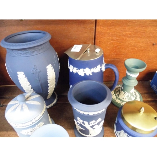 669 - A collection of Wedgwood Jasperware; vase, lidded pots, preserve pot, jug, etc. (11)