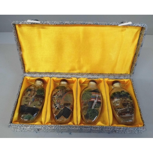 670 - A set of four Chinese snuff/scent bottles