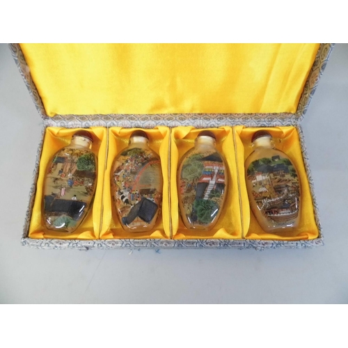 670 - A set of four Chinese snuff/scent bottles