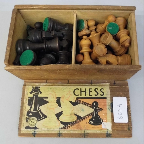 680A - A vintage carved wooden chess set