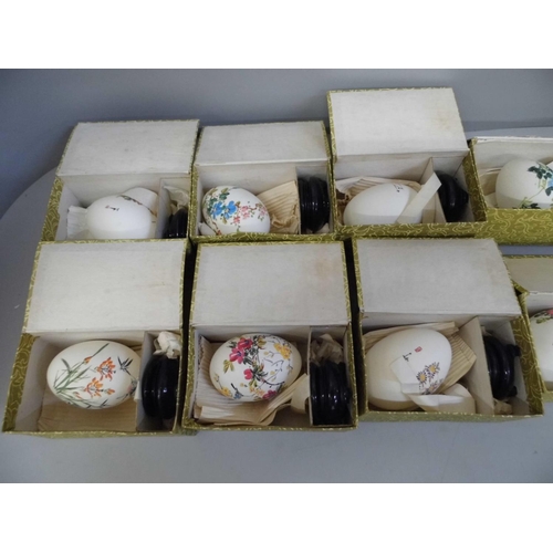 689 - Three boxes of hand painted Chinese eggs and stands (18)