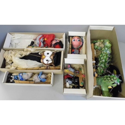 692 - A collection of six Pelham puppets; Dragon, Booster, Cat, Giraffe, Fritzi and Owl, boxed