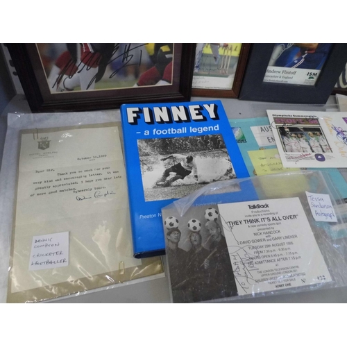 694 - Sporting memorabilia; a collection of autographed items including a letter from Dennis Compton, a bo... 