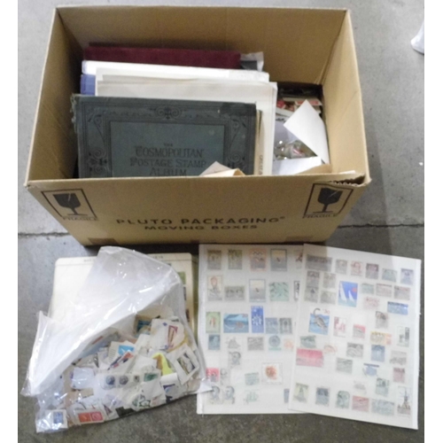 696 - Stamps; a box of stamps, covers, etc., loose and in albums