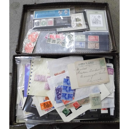 699 - Stamps; a case of GB stamps, covers, etc.