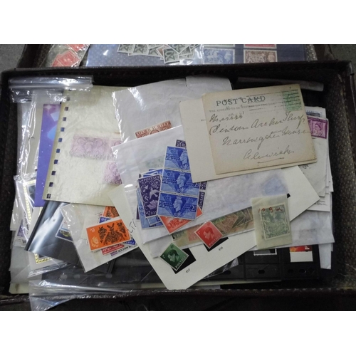 699 - Stamps; a case of GB stamps, covers, etc.