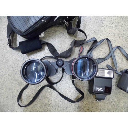 708 - A pair of binoculars, Pentax 35mm film camera, etc.