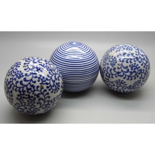 709 - Three blue and white carpet bowls