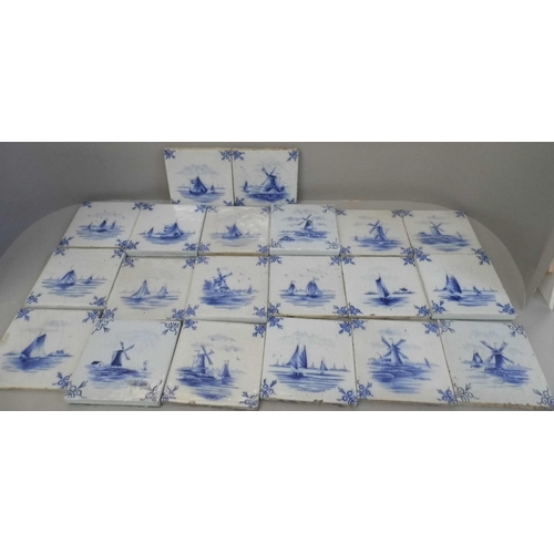 712 - A box of twenty 18th Century blue and white Delft tiles