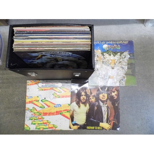 727 - A collection of Rock LP records including AC/DC, Moody Blues, Genesis, etc.