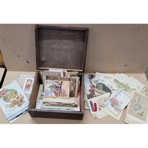 738 - A box of Edwardian and later postcards and greetings cards