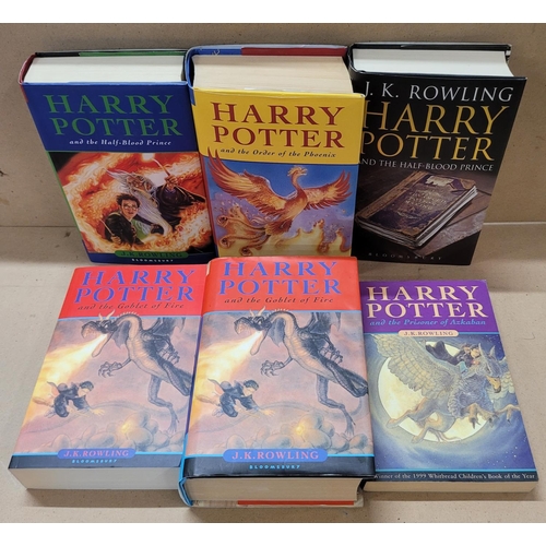 743 - Six Harry Potter books including four hardback first editions