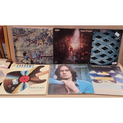 748 - A collection of thirty-five rock and pop LP records