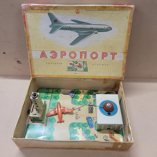 765 - A circa 1957 Russian Airport tin plate wind up toy, boxed