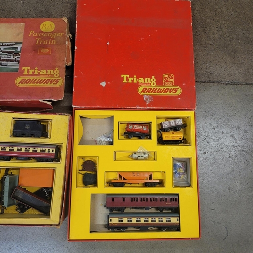 766 - 1950s Triang OO gauge set and other rolling stock, spares and over 40ft of track and level crossing