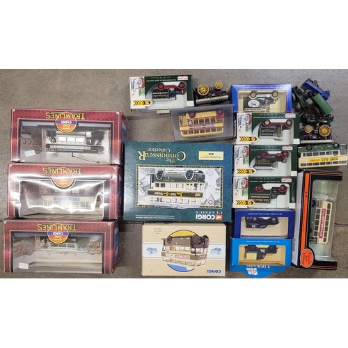 767 - A collection of model trams, buses, traction engines and other model vehicles, boxed