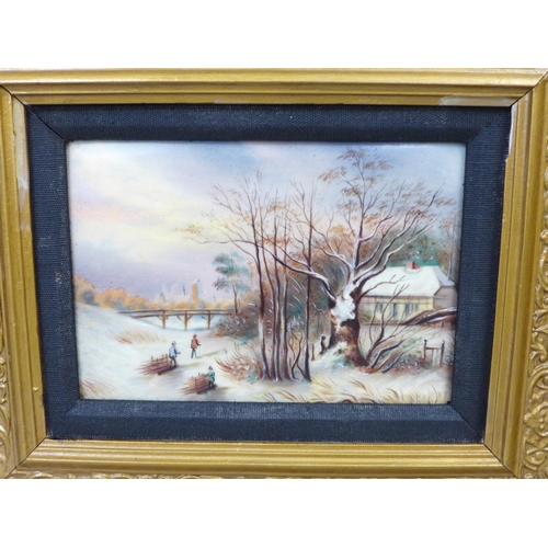 790 - A pair of hand painted porcelain plaques in gilt frames