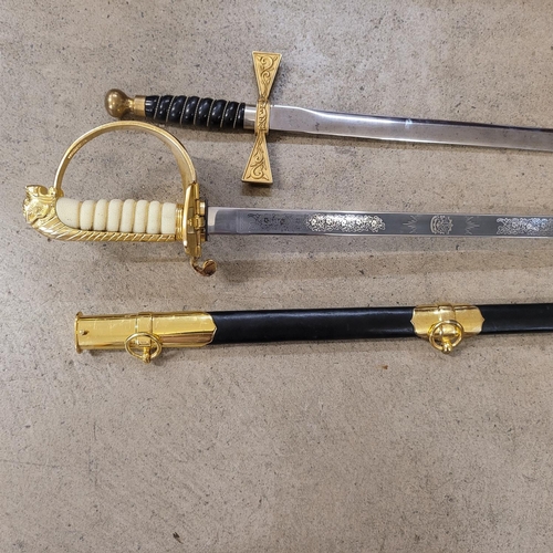 800 - Two swords, one blade marked Wilkinson, possibly Masonic and one other sword