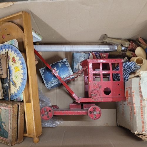 803 - A pressed steel toy crane, a Mary Lou battery operated toy washing machine, three Kewpie dolls, baga... 