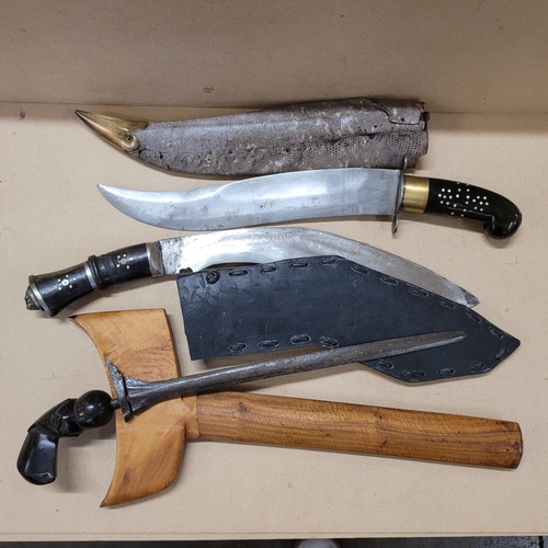 807 - A kukri, a kris and one other dagger