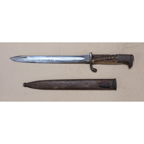 808 - A bayonet with antler handle and scabbard