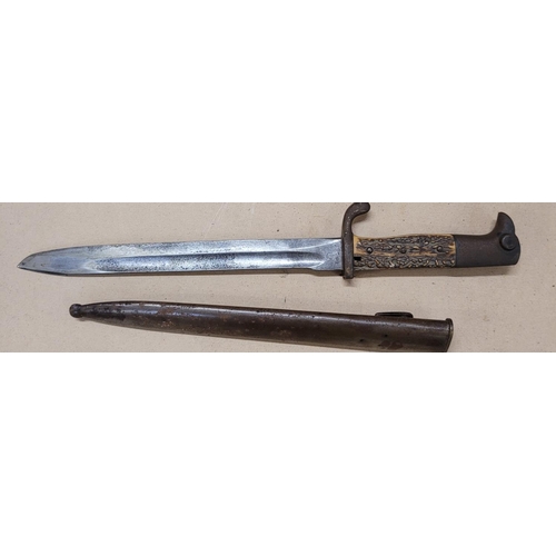 808 - A bayonet with antler handle and scabbard